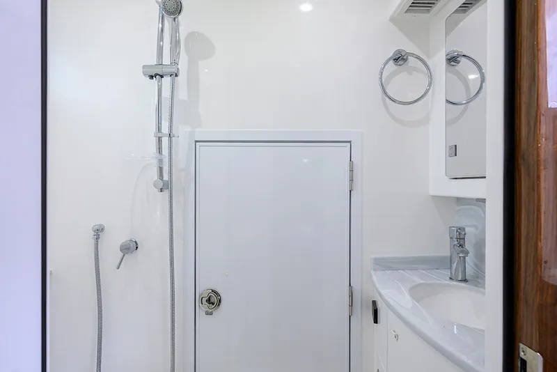 Slide: The Image of Modern bathroom in 2026 Valhalla V-46 yacht with shower and sink. - 27