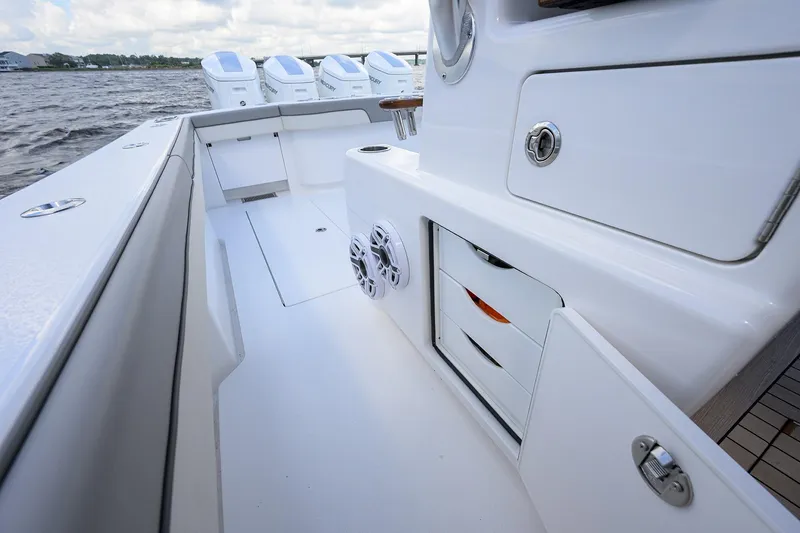 Slide: The Image of 2026 Valhalla V-46 boat interior with storage compartments and sleek design. - 33