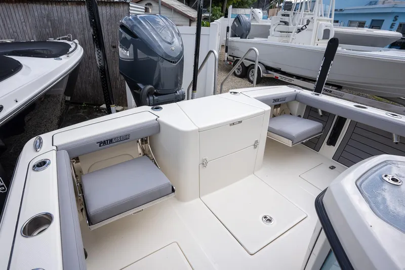 Slide: The Image of 2025 Pathfinder 2400 Open boat interior with seating and Yamaha outboard motor. - 4