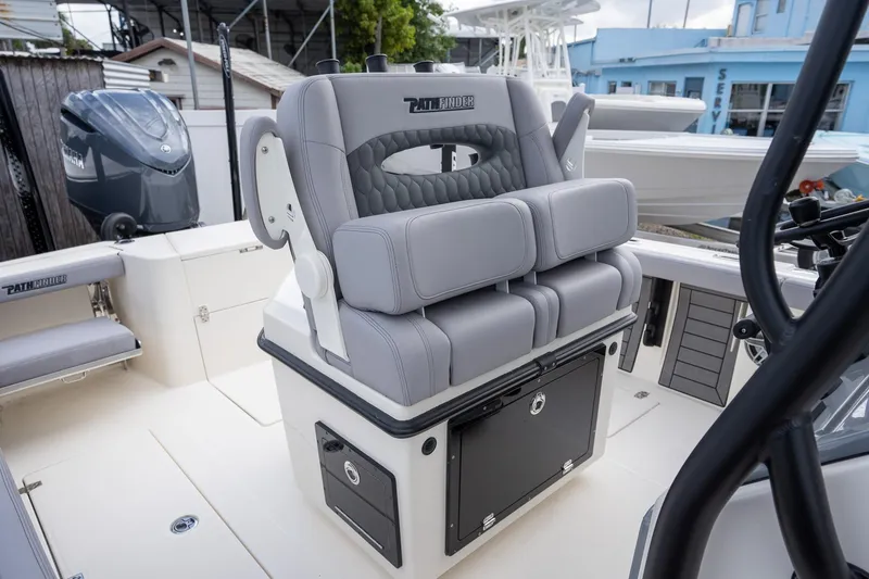 Slide: The Image of 2025 Pathfinder 2400 Open boat interior with cushioned seating and storage compartments. - 5