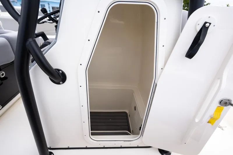 Slide: The Image of 2025 Pathfinder 2400 Open boat storage compartment with open door. - 6