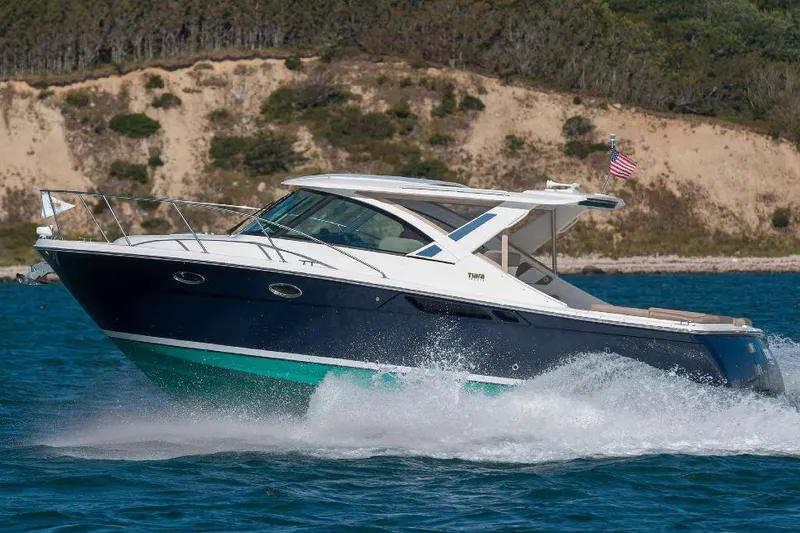 The Image of Manufacturer Provided Image: 2018 Tiara Yachts 31 cruising on the water with scenic background. - 1