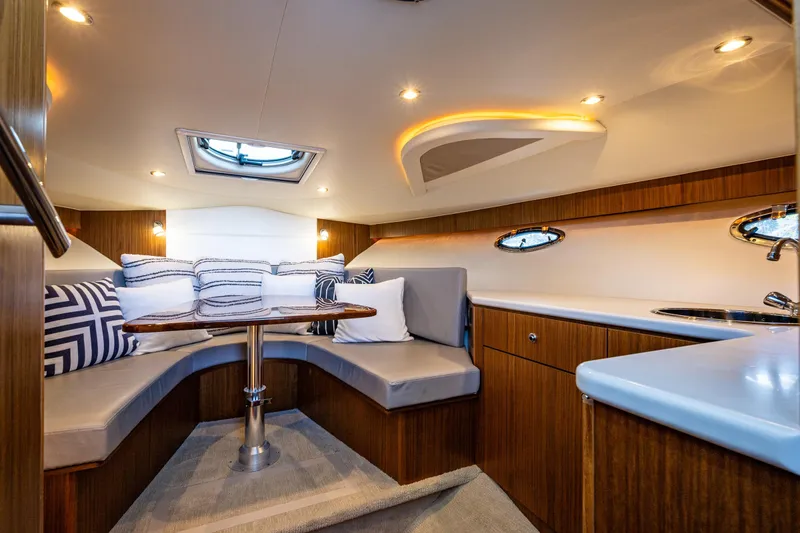 Slide: The Image of Luxurious interior of 2018 Tiara Yachts 3100 Coronet with elegant seating and modern amenities. - 23