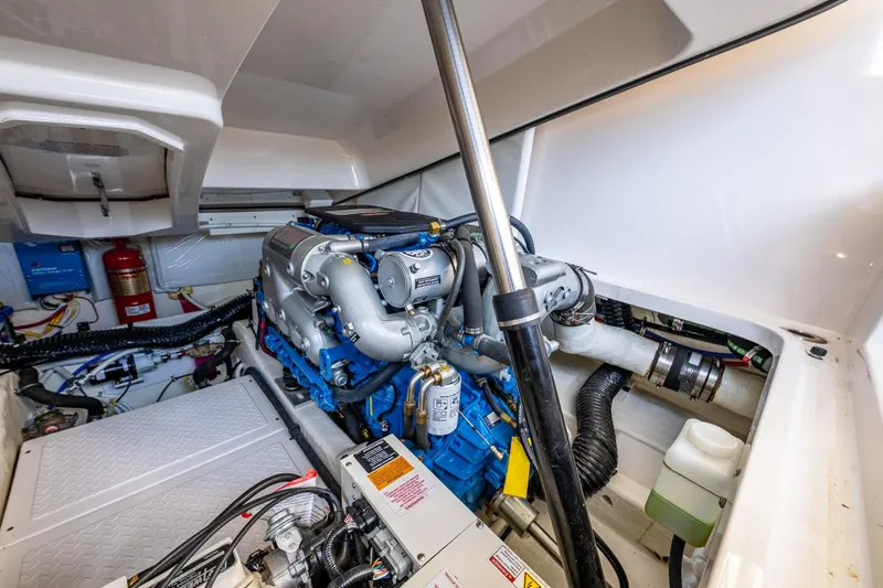 Slide: The Image of Engine compartment of a 2018 Tiara Yachts 31, showcasing detailed mechanical components. - 39
