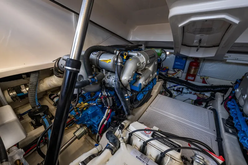 Slide: The Image of Engine compartment of a 2018 Tiara Yachts 31, showcasing Westerbeke Generator - 42