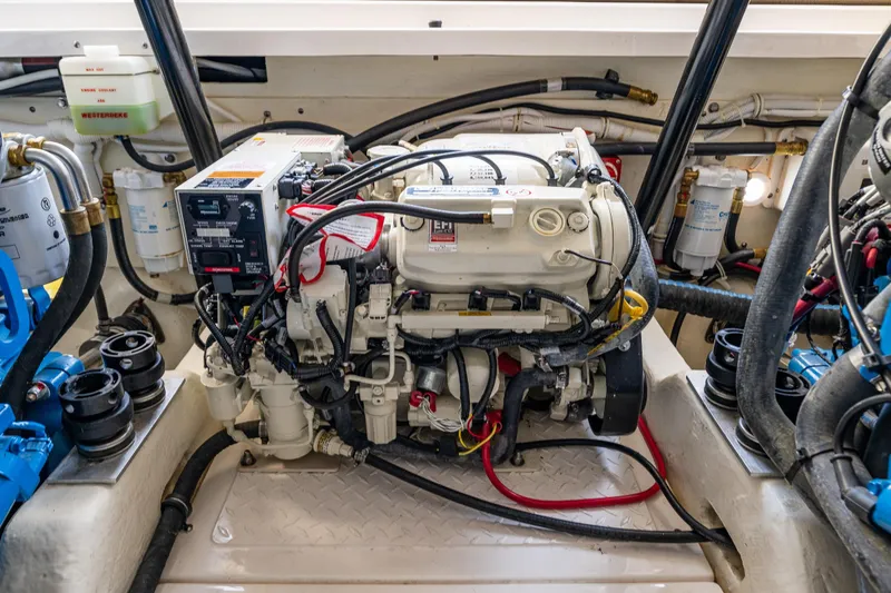 Slide: The Image of Engine compartment of a 2018 Tiara Yachts 31, showcasing detailed mechanical components. - 43