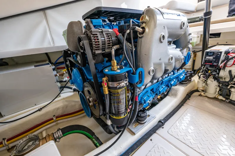 Slide: The Image of Engine compartment of a 2018 Tiara Yachts 31, showcasing detailed mechanical components. - 45