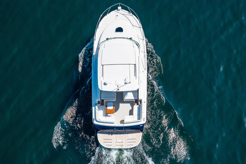 Slide: The Image of Aerial view of 2018 Tiara Yachts 31 cruising on Lake. - 8
