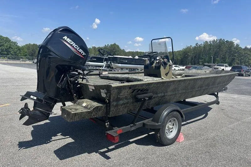 Slide: The Image of 2026 Tracker Grizzly 1860 CC boat on trailer with Mercury outboard motor. - 5