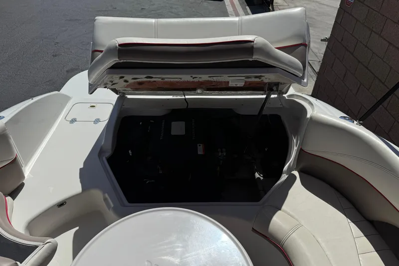 Slide: The Image of 2003 Four Winns 214 Funship boat interior with open engine compartment. - 20