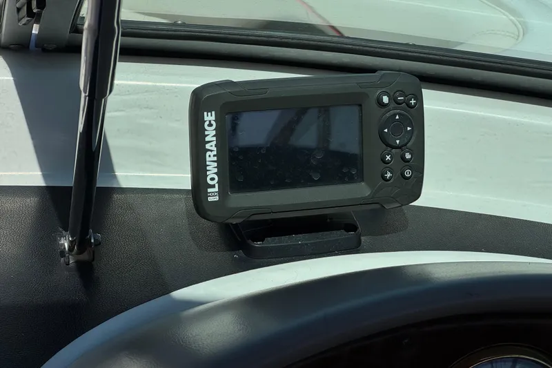 Slide: The Image of Lowrance fish finder on 2003 Four Winns 214 Funship dashboard. - 27