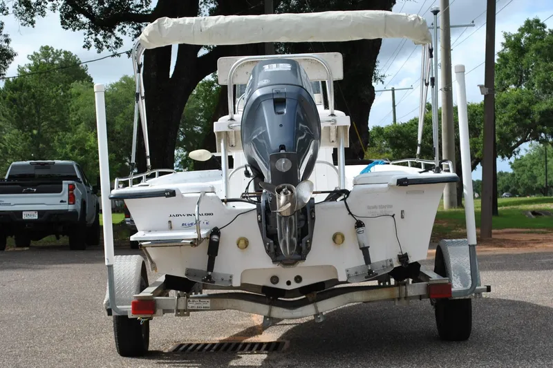 Slide: The Image of 2007 Blue Wave 180 V-Bay boat on trailer, rear view with outboard motor. - 10