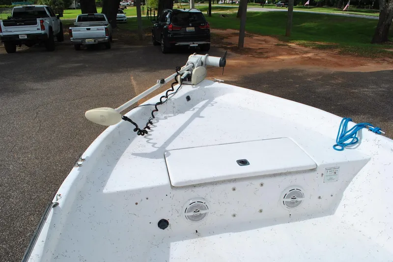 Slide: The Image of 2007 Blue Wave 180 V-Bay boat with trolling motor in parking lot. - 13