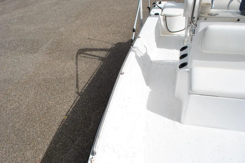 Slide: The Image of 2007 Blue Wave 180 V-Bay boat interior, showing seating and deck details. - 15