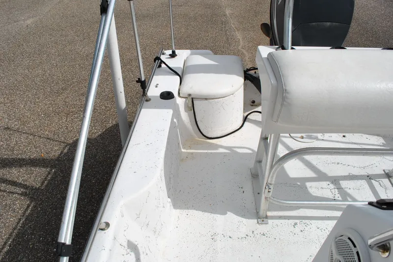 Slide: The Image of 2007 Blue Wave 180 V-Bay boat interior, featuring seating and storage compartments. - 20