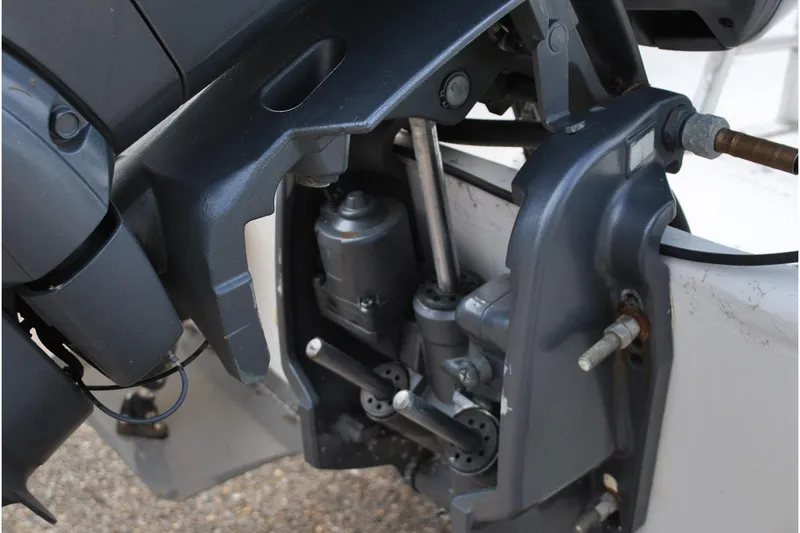 Slide: The Image of Close-up of a 2007 Blue Wave 180 V-Bay boat engine components. - 25