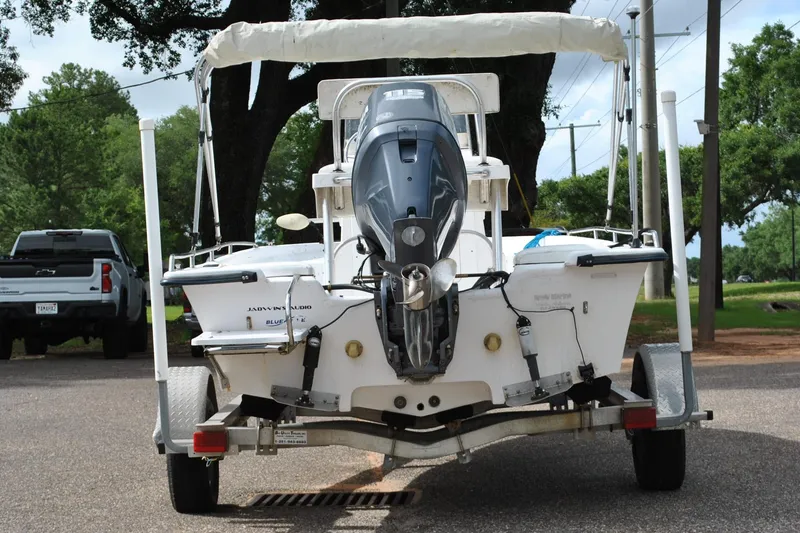 Slide: The Image of 2007 Blue Wave 180 V-Bay boat on trailer, rear view with outboard motor. - 9