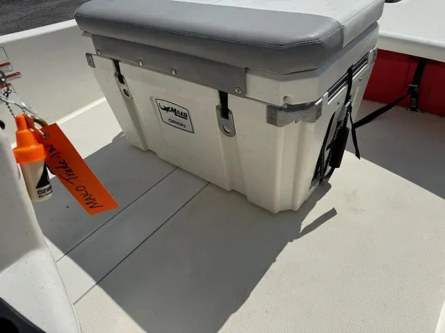 Slide: The Image of Mako Pro Skiff 15 CC 2023 with cooler and accessories. - 12
