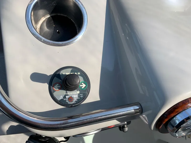 Slide: The Image of Control panel of a 2005 Formula 34 Performance Cruiser with a cup holder and joystick. - 20