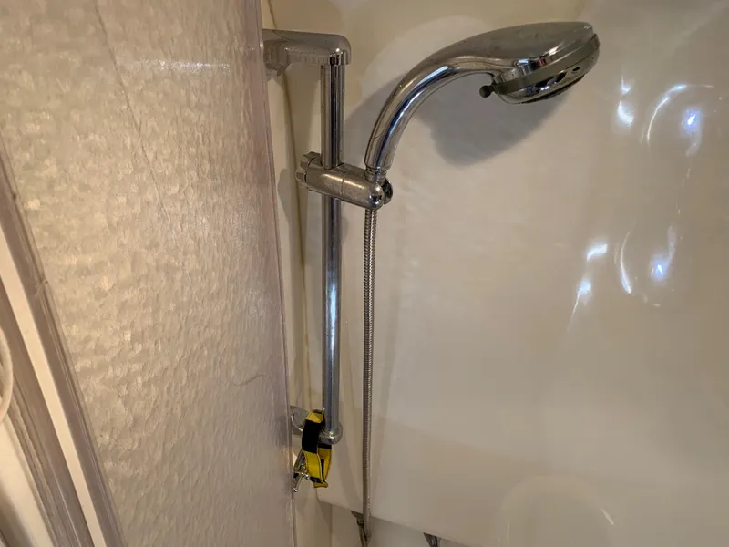 Slide: The Image of Shower area in 2005 Formula 34 Performance Cruiser with chrome handheld showerhead. - 32