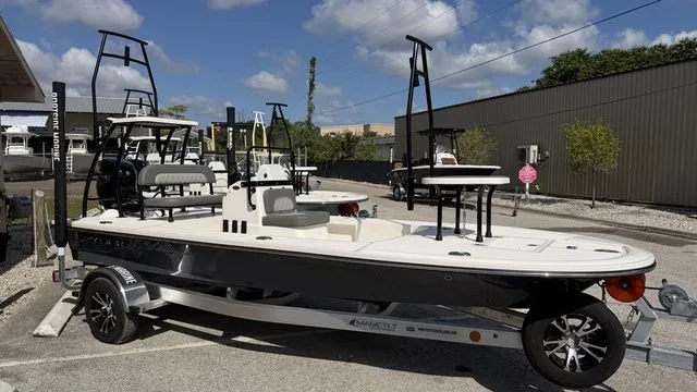 The Image of 2026 Spyder FX17 Flicker boat on trailer outdoors. - 1