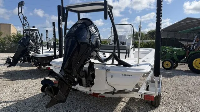 Slide: The Image of ALK2 Powerboats 17HS 2026 with outboard motor on gravel lot. - 3