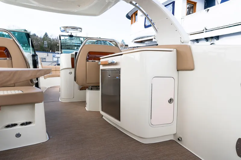 Slide: The Image of 2025 Chris-Craft Launch 35 GT interior with seating and cabinetry. - 16