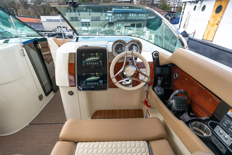 Slide: The Image of 2025 Chris-Craft Launch 35 GT cockpit with modern controls and luxurious seating. - 21
