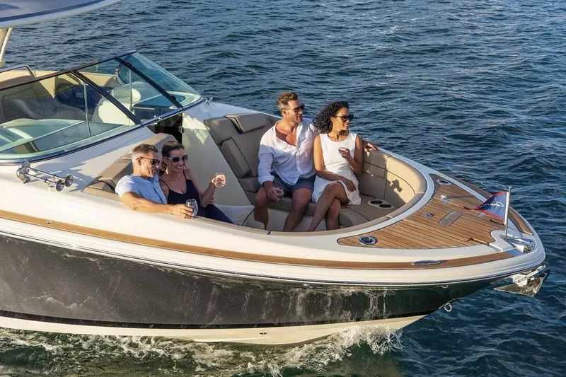 Slide: The Image of Manufacturer Provided Image: 2025 Chris-Craft Launch 35 GT cruising with four passengers on a sunny day. - 6