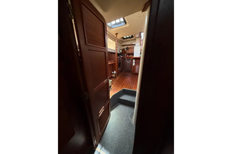 Slide: The Image of Interior view of 1984 Stamas 44 yacht with wooden flooring and cabinetry. - 24