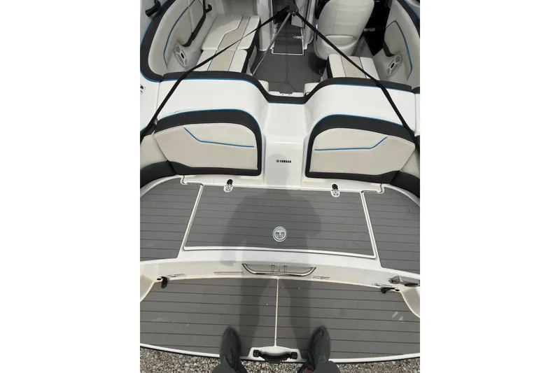 Slide: The Image of 2019 Yamaha Boats AR210 interior with sleek seating and modern design. - 11
