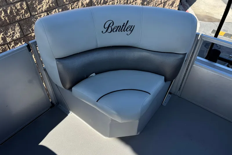 Slide: The Image of 2018 Bentley Pontoons 180 CRUISE boat seat with elegant gray upholstery. - 12