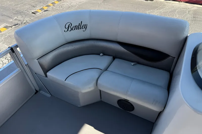 Slide: The Image of 2018 Bentley Pontoons 180 CRUISE boat seating with elegant gray upholstery. - 13