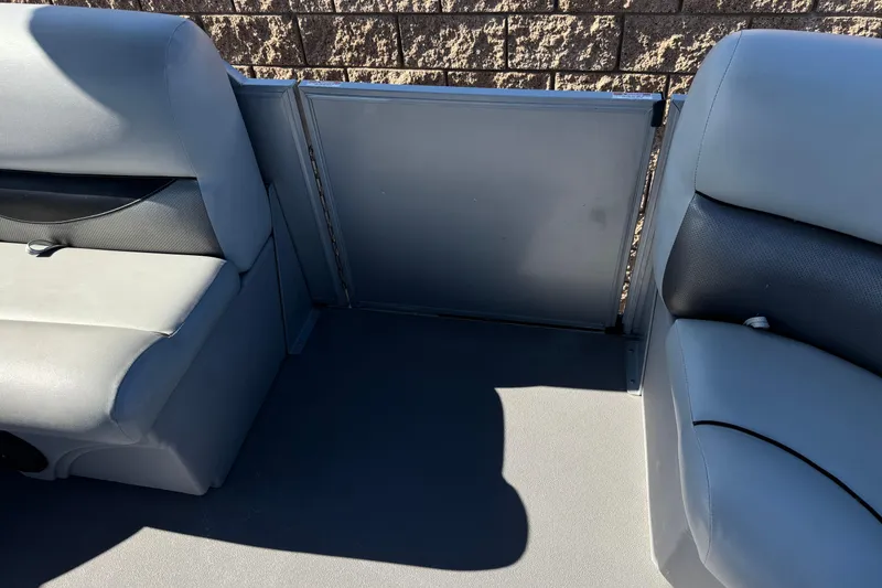 Slide: The Image of Interior seating of a 2018 Bentley Pontoons 180 CRUISE, featuring gray upholstery. - 14