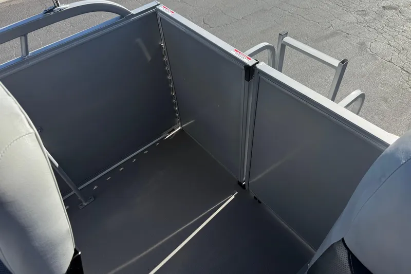 Slide: The Image of 2018 Bentley Pontoons 180 CRUISE interior with seating and storage area. - 16