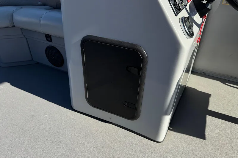Slide: The Image of 2018 Bentley Pontoons 180 CRUISE interior with storage compartment and seating. - 20