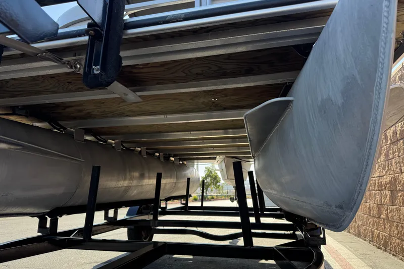 Slide: The Image of Underneath view of a 2018 Bentley Pontoons 180 CRUISE on a trailer. - 4