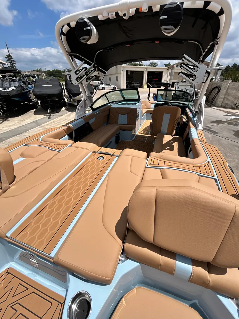 Slide: The Image of Interior of 2026 MasterCraft XT23 with luxurious seating. - 16
