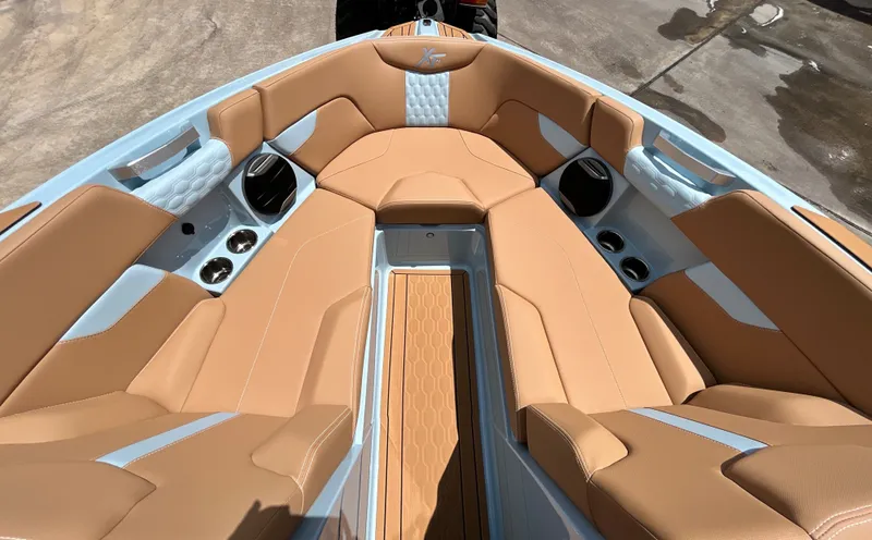 Slide: The Image of Interior of 2026 MasterCraft XT23 with luxurious leather seating. - 17