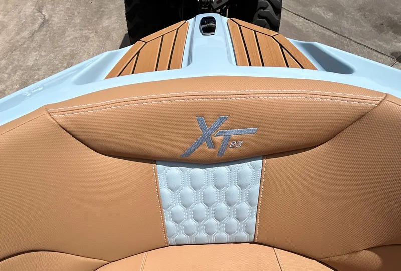 Slide: The Image of 2026 MasterCraft XT23 boat with stylish seat design. - 18