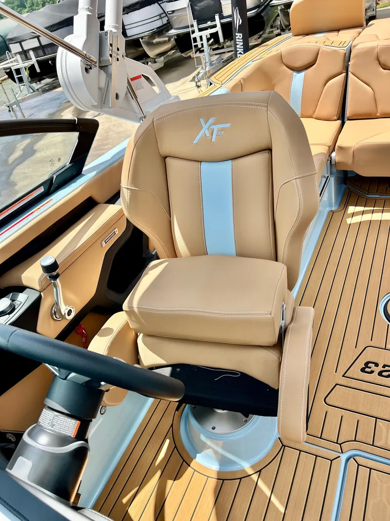Slide: The Image of Interior of 2026 MasterCraft XT23 with luxurious seating. - 26