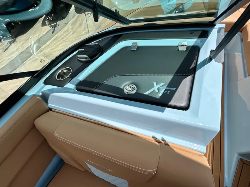 Slide: The Image of Interior view of 2026 MasterCraft XT23 boat, dashboard and seats. - 33