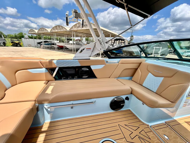 Slide: The Image of Interior of 2026 MasterCraft XT23 with luxurious seating. - 36