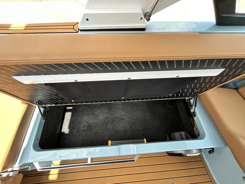 Slide: The Image of Storage compartment in 2026 MasterCraft XT23 boat. - 39