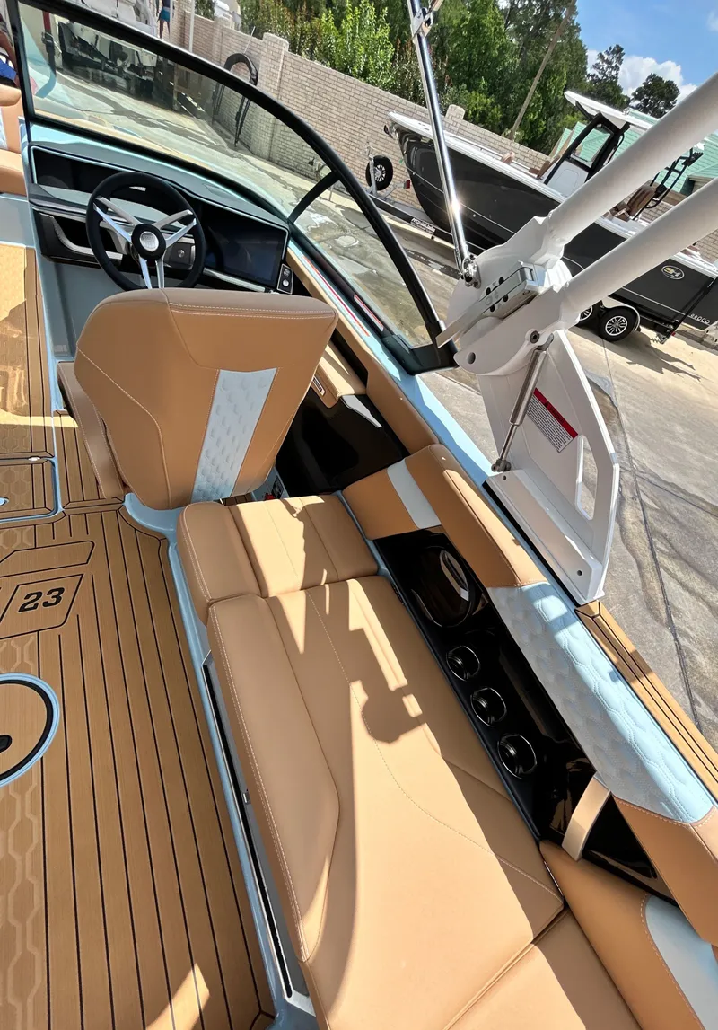 Slide: The Image of 2026 MasterCraft XT23 interior with luxurious leather seating. - 41