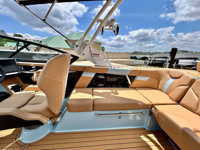 Slide: The Image of Interior of 2026 MasterCraft XT23 with luxurious leather seating. - 42