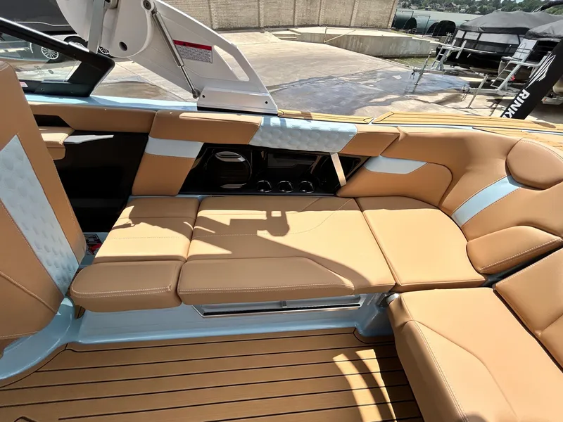 Slide: The Image of Interior of 2026 MasterCraft XT23 with luxurious leather seating. - 43