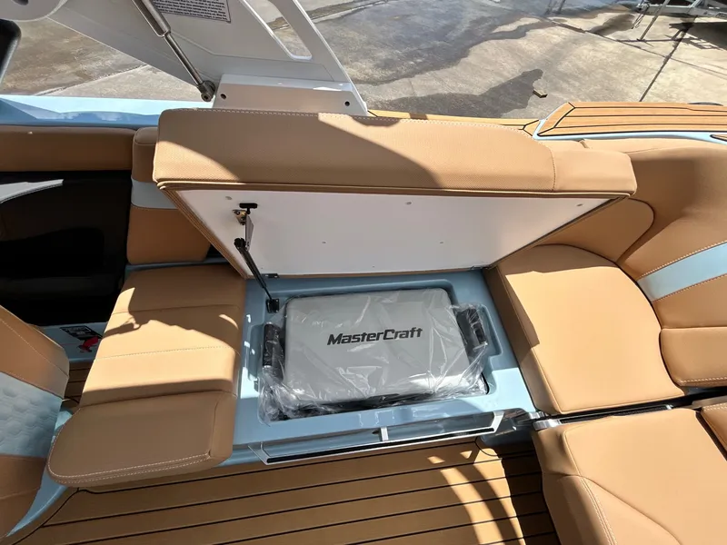 Slide: The Image of Interior of 2026 MasterCraft XT23 with under-seat storage. - 45
