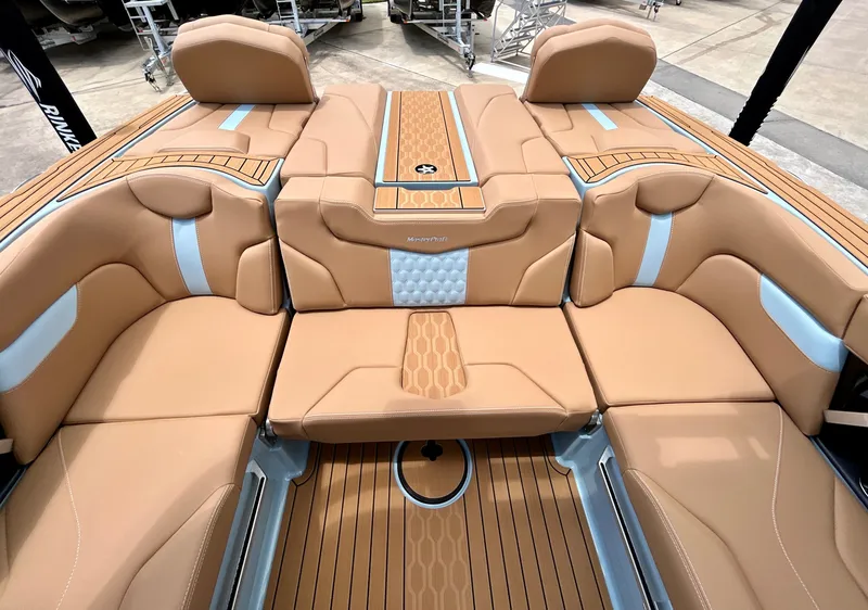 Slide: The Image of Interior of 2026 MasterCraft XT23 with luxurious leather seating. - 47