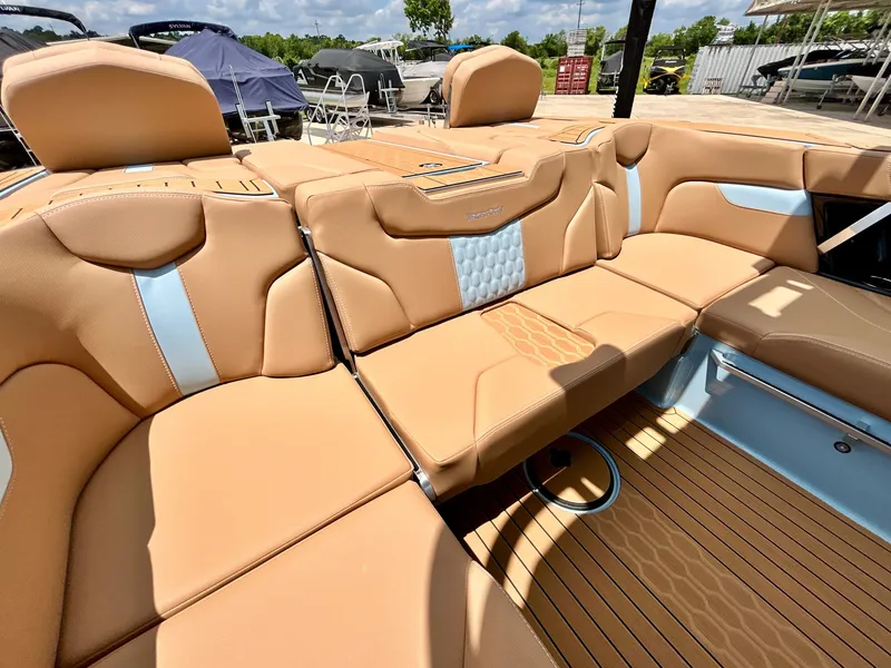 Slide: The Image of Interior of 2026 MasterCraft XT23 with luxurious leather seating. - 48